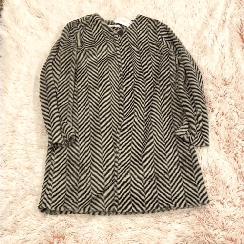 Women’s large long coat black,gray and white color. Very soft and cozy looking.